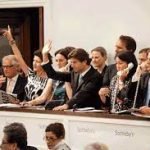 Why Do People Bid at Auctions People Bid at Auctions